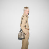 Emblem small bucket bag
