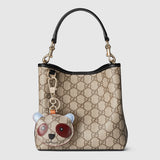 Emblem small bucket bag