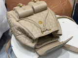 Medium Caro Backpack Desert Taupe Macrocannage Lambskin