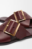 Petal Belt flat sandal in vegetable-tanned calfskin