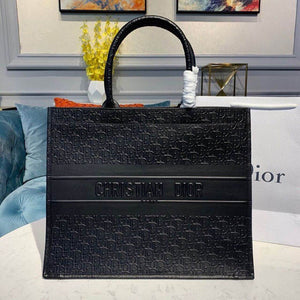Christian   Oblique Embossed Calfskin Leather Book Tote M1296