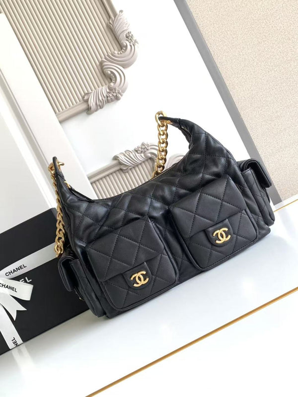 Elegant Black CC Handbag Featuring Quilted Design and Gold - Tone Chain Straps
