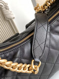 Stylish Black Handbag with Gold Hardware