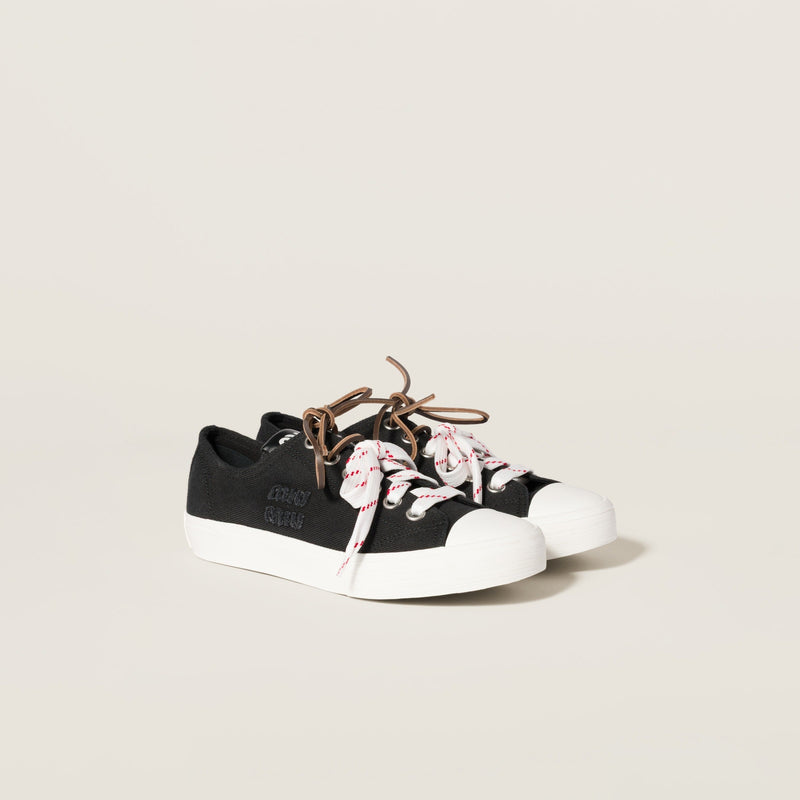 miumiu Washed denim sneakers