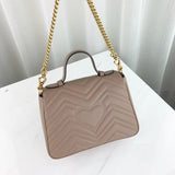 GG Marmont Matelasse Top Handle Bag 498110