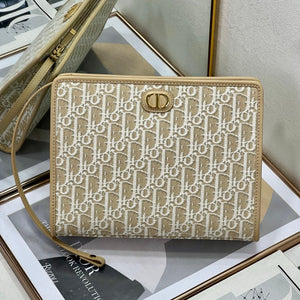 Oblique Canvas Clutch - Iconic Monogram Design Timeless Style