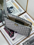 Oblique Canvas Clutch with Signature Monogram Pattern