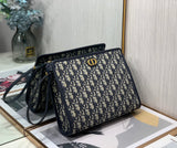 Oblique Canvas Clutch with Signature Monogram Pattern