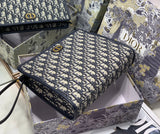 Oblique Canvas Clutch with Signature Monogram Pattern