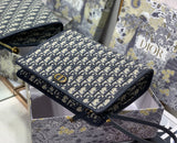 Oblique Canvas Clutch with Signature Monogram Pattern