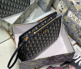 Oblique Canvas Clutch with Signature Monogram Pattern
