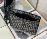 Oblique Canvas Clutch with Signature Monogram Pattern